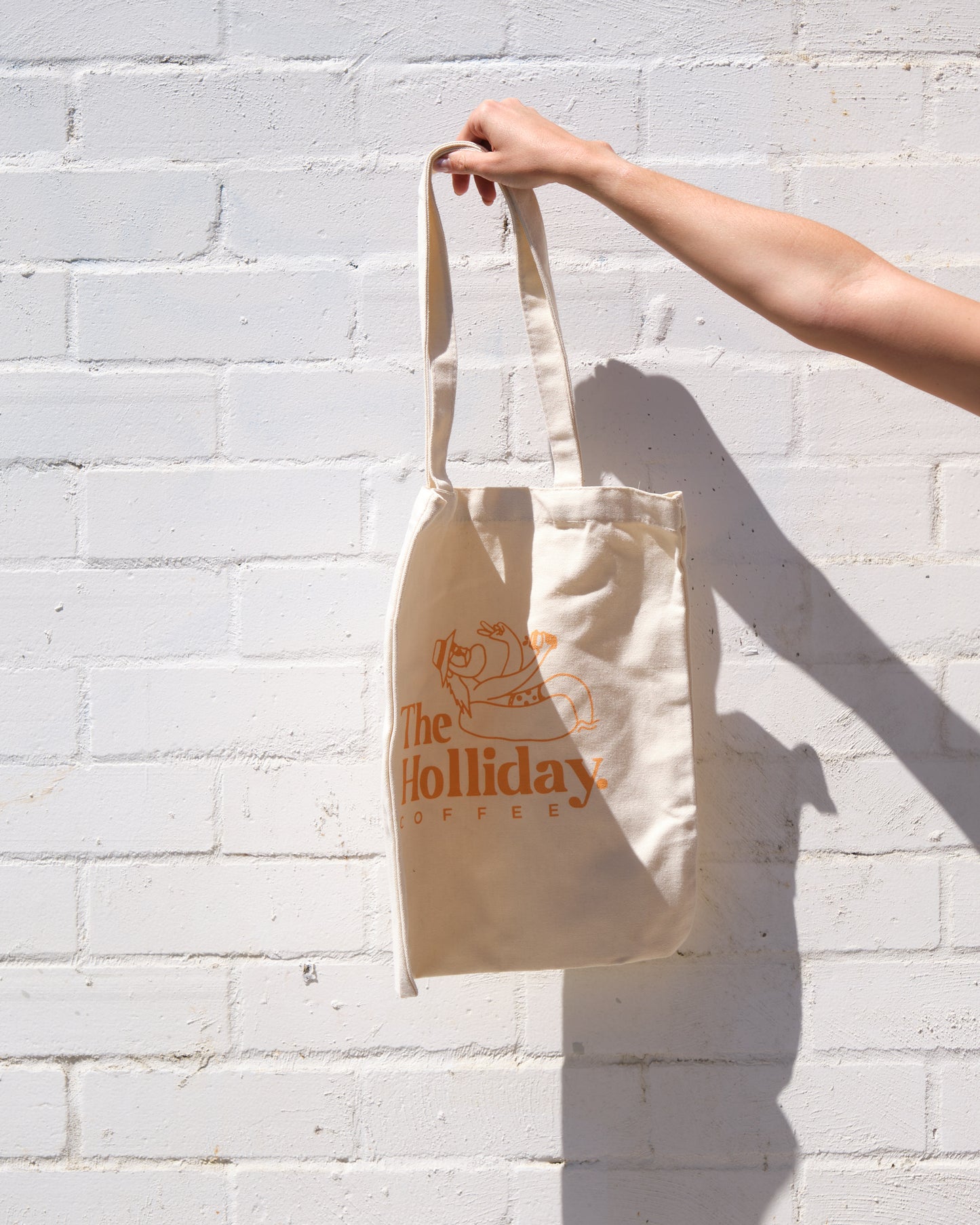 The Holliday. Tote Bag