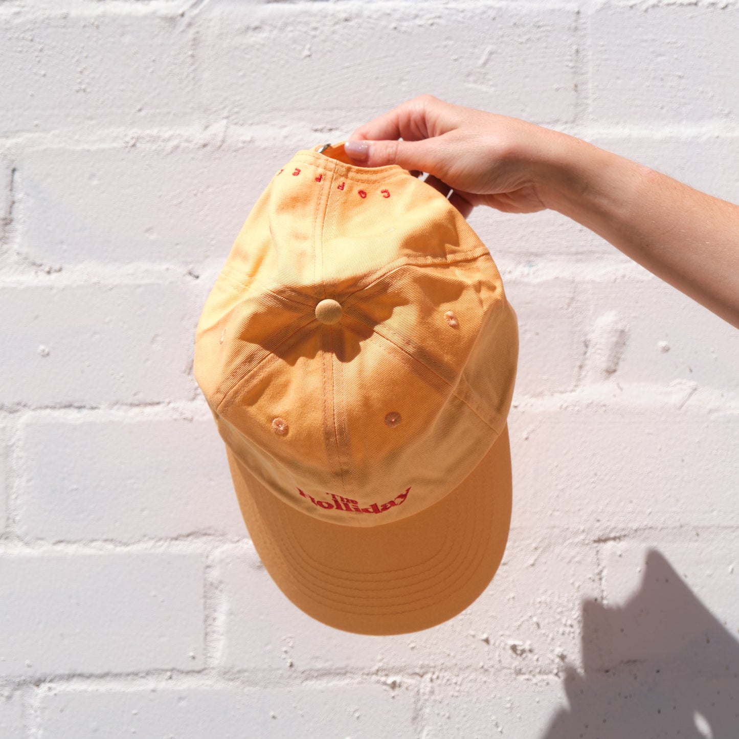 The Holliday. Cap