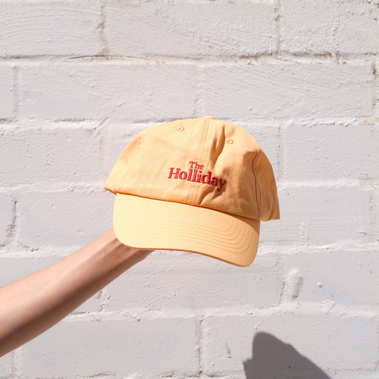 The Holliday. Cap