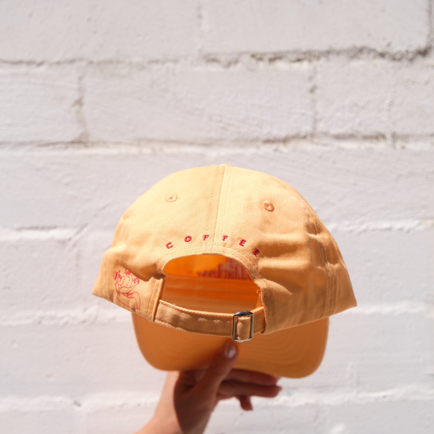 The Holliday. Cap