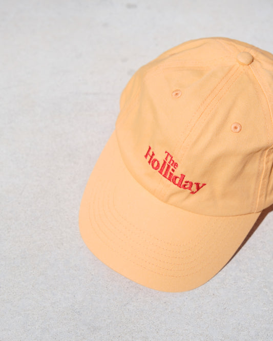 The Holliday. Cap